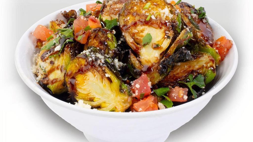 Brussels Sprouts (Balsamic Glazed) · You’ll finally be happy to eat your Brussels sprouts.  Quick-fried with a balsamic glaze and topped with fresh herbs and parmesan cheese, you might even ask for seconds.