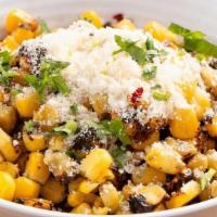 Fire Roasted Street Corn · Delicious charred sweet corn with chili flakes, garlic butter, parmesan cheese and cilantro....