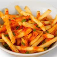 Dynamite Fries · Served with our signature Dynamite Sauce with Serrano Chili & Fresh Herbs
