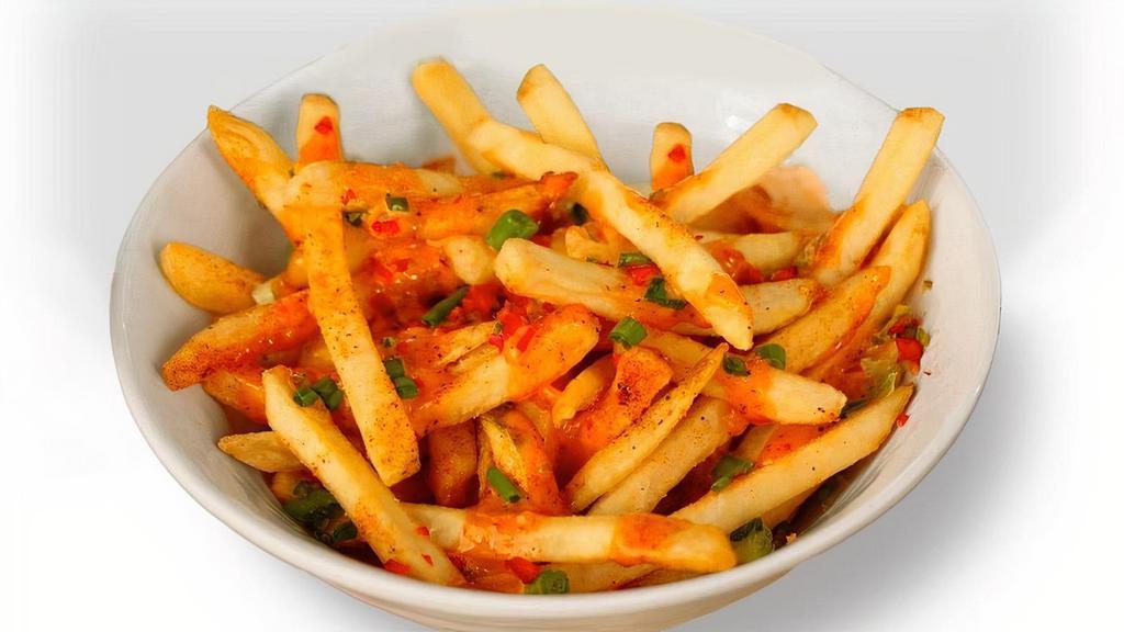 Dynamite Fries · Served with our signature Dynamite Sauce with Serrano Chili & Fresh Herbs