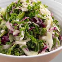 Kaleslaw · A modern twist on a classic. Chopped kale and cabbage mix tossed with our unique dressing.