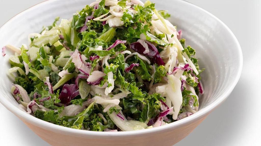 KALESLAW · A modern twist on a classic. Chopped kale and cabbage mix tossed with our unique dressing.