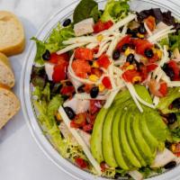 Southwest Chicken Salad · Baby greens and chopped romaine, grilled chicken, sliced avocado, black bean corn salsa, sou...