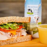 Kids Meal - Sandwich · Half Sandwich Served on sliced Honey Wheat Bread, Applesauce, Milk or Bottled Water