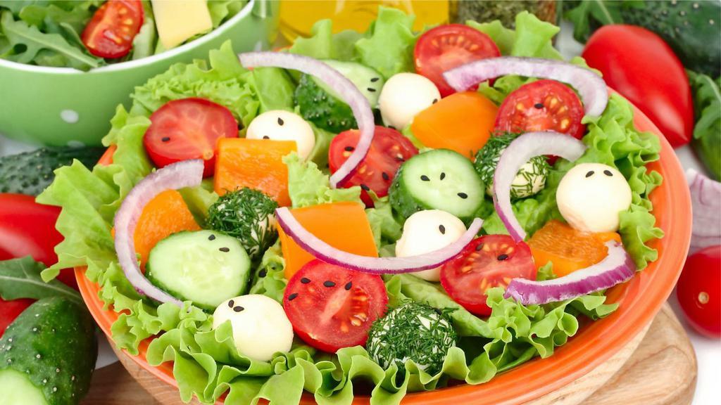 House Garden Salad · Lettuce, tomatoes, cucumber and olives.