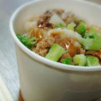 61. Braised Wonton · Small wonton in Taiwanese style topped with house braised pork and sauce.