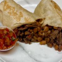 Regular Burrito · Flour tortilla, meat choice, beans, and fresh salsa.