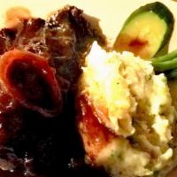 American Kobe Beef Short Rib Slow Oven Braised · Horseradish mashed potatoes, white truffle salt