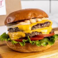 Double Cheeseburger · 1/2 lb fresh, organic, grass fed California beef with double American cheese. Served with le...