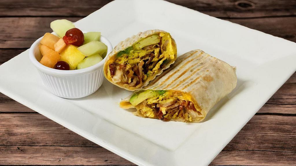 Breakfast Wrap · scrambled eggs with pinch of S&P, bacon, tomato, avocado, cheddar cheese, flour tortilla, side of fruit