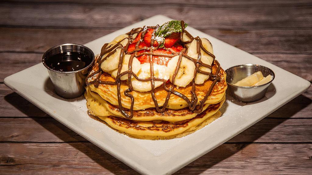 Strawberry Pancakes · topped with powdered sugar, side syrup. 🅥=Vegetarian