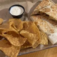 Quesadilla · Crispy flour tortilla, feather shredded monterey jack cheese and your choice of meat.