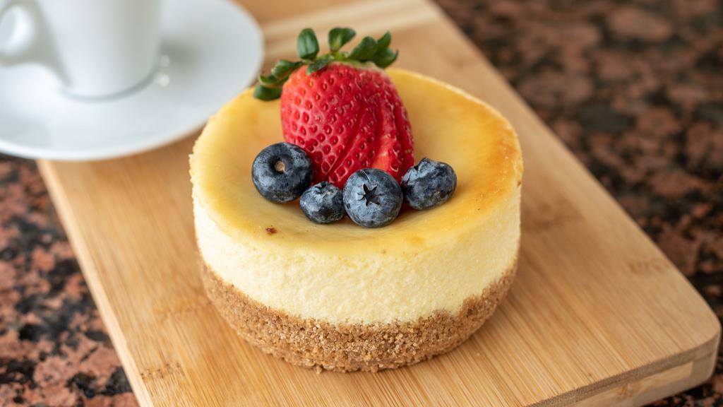 Fruit Cheesecake · Graham crust and rich New York Cheesecake topped with fresh fruit. Fruit may vary depending on availability.