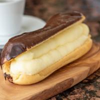 Chocolate Éclair · Old fashioned éclair filled with fresh whipped cream or custard topped with a rich chocolate...