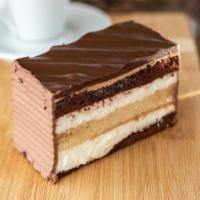 Black and White · Vanilla and chocolate layers alternating with fresh whipped cream and topped with a rich fud...