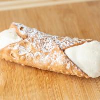 Cannoli · A crisp cannoli shell filled with a slightly sweetened and creamy ricotta filling and sprink...