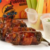 Jalapeño Pig Poppers · Bacon-wrapped, fire roasted jalapeños, stuffed with andouille, pimento cream cheese, glazed ...