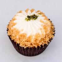Key Lime Pie (Customer favorite) · Graham cracker crust, vanilla cake filled with lime curd, topped with whipped cream.
