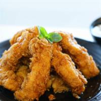 Chicken Strips · Korean style deep fried chicken strips. Accompanied with (2) sauces of your choice!