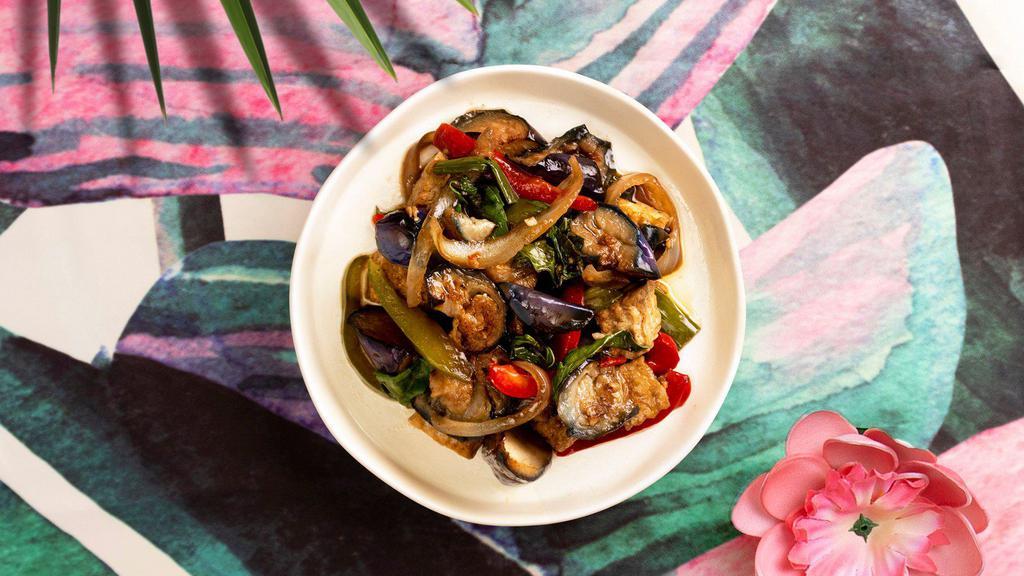 Stir-fried Eggplant · Stir-fried eggplant, chiles, basil, garlic, onions, and bell peppers and your choice of tofu or vegetables.