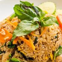 Thai Fried Rice · Vegan Thai fried rice with onions and your choice of tofu or vegetables.
