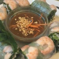 #2. Goi Cuon (Shrimp Spring Rolls) (2) · Wrapped in rice paper w/ lettuce and rice vermicelli, serve w/ peanut sauce.