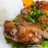 #30. Ga Ngu Vi Huong (Five Spices Roast Chicken Over Rice) · Tender roasted chicken seasoned with five spices.

Comes with Jasmine rice.