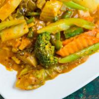 V15. Sauteed Mixed Vegetables with Coconut and Curry · Comes with Jasmine rice.