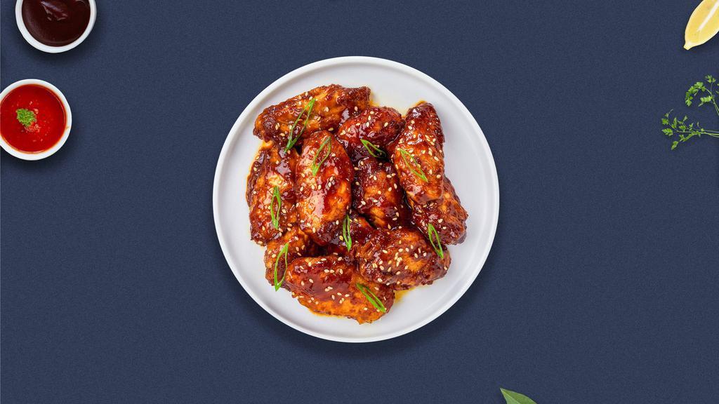 Sesame St. Garlic Wings · Fresh chicken wings breaded, fried until golden brown, and tossed in sesame garlic sauce.
