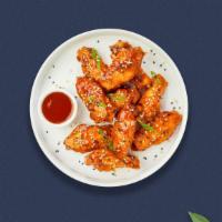 S&S Chicken Wings · Fresh chicken wings breaded, fried until golden brown, and tossed in sweet and sour sauce.