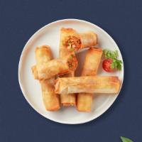 They See Me Egg Rollin' · Golden flakey egg rolls with your choice of filling.