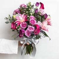 Pretty In Purple Large Bouquet · Roses, spray roses, double lilies, mini callas, tulips, fillers and greens.
