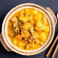 Singapore Nonya Style Spicy Chicken Curry · Malaysian-Chinese home recipe of tender chicken, potatoes, celery, and carrots with herbs an...