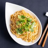 Garlic Butter Noodles · Buttered garlic house-made chewy noodles, topped with chopped cilantro. Contains gluten, dai...