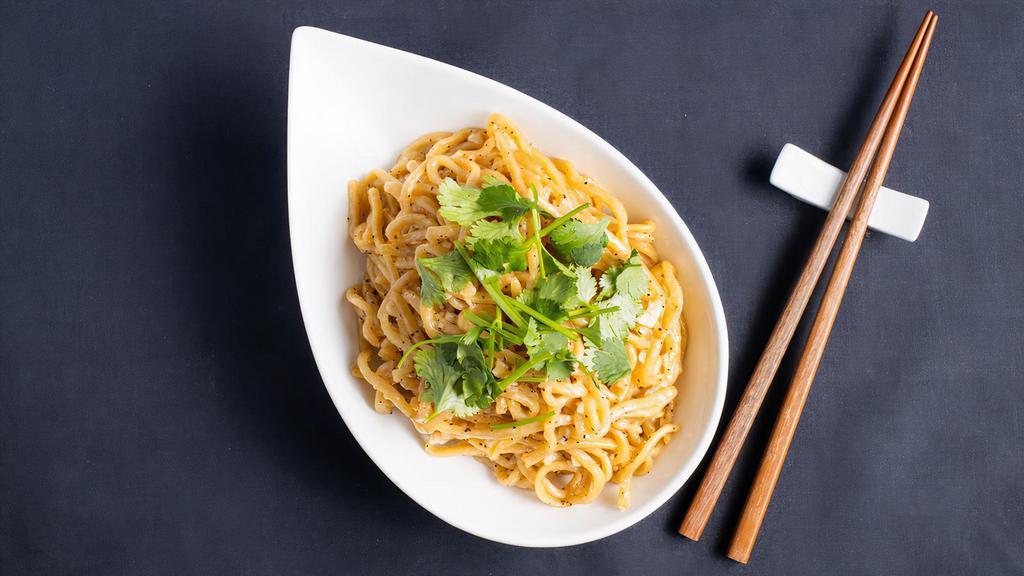 Garlic Butter Noodles · Buttered garlic house-made chewy noodles, topped with chopped cilantro. Contains gluten, dairy, shellfish, and eggs. We cannot make substitutions.