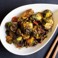 Brussel Sprouts · Caramelized brussel sprouts seasoned with curry spice and chilis. Contains nightshades. We c...