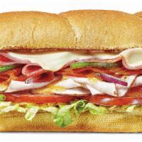 Turkey Italiano · Tender oven roasted turkey with genoa salami, spicy pepperoni, melty American cheese. All on...