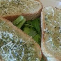 Garlic Bread · Fresh garlic, extra virgin olive oil, butter and herbs.