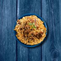 Aromatic Goat Biryani  · Long grain imported 'basmati' rice layered with a curry of bone-in goat meat cooked in our f...