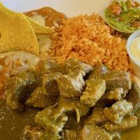 Chile Verde Dinner Platter · Chunky pork in green sauce. Side of rice & beans. Tortillas, sour cream and guacamole.