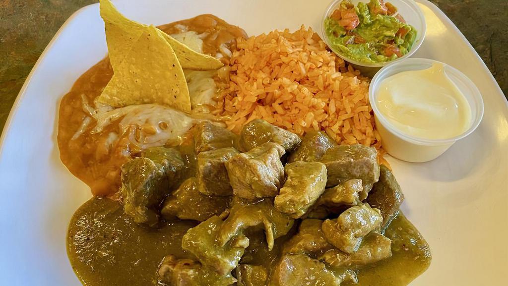 Chile Verde Dinner Platter · Chunky pork in green sauce. Side of rice & beans. Tortillas, sour cream and guacamole.