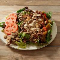 Philly Salad · A Generous 7-Ounce Portion of Grilled Steak or Chicken with Melted Cheese, Served on a Bed o...