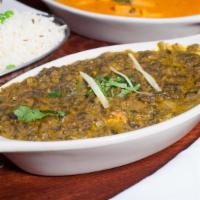 Saag Paneer · Homemade cottage cheese and creamed spinach cooked with garam masala gravy.