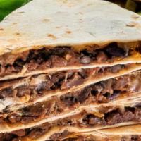 Veggie Quesadilla · Cheese quesadilla with sauteed onions and peppers