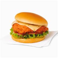 Spicy Deluxe Sandwich · A boneless breast of chicken seasoned with a spicy blend of peppers, hand-breaded, pressure ...