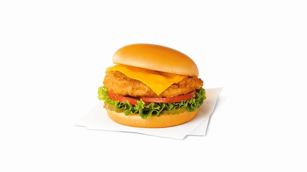 Chick-Fil-A® Deluxe Sandwich · A boneless breast of chicken seasoned to perfection, freshly breaded, pressure cooked in 100% refined peanut oil and served on a toasted, buttered bun with dill pickle chips, Green Leaf lettuce, tomato and American cheese. Also available on a multigrain bun.