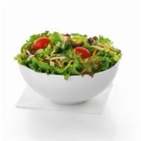 Side Salad · A fresh bed of mixed greens, topped with a blend of shredded Monterey Jack and Cheddar chees...