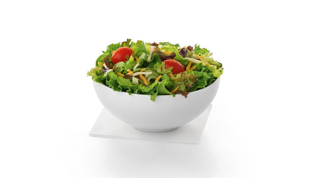 Side Salad · A fresh bed of mixed greens, topped with a blend of shredded Monterey Jack and Cheddar cheeses and grape tomatoes. Prepared fresh daily. Served with charred tomato, crispy red bell peppers and choice of dressing.