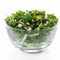 Kale Crunch Side · A blend of Curly Kale and Green Cabbage tossed with an Apple Cider and Dijon Mustard vinaigr...