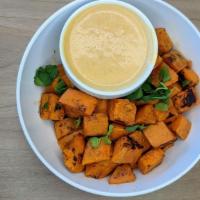 Side: Roasted Sweet Potatoes · Roasted Sweet Potatoes with Thai Curry sauce (or choice of sauce)